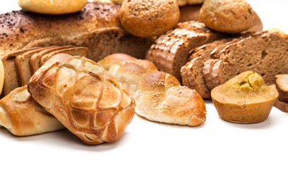 Composition with bread and rolls isolated on white