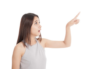 Beautiful young Asian woman shocked  and point up