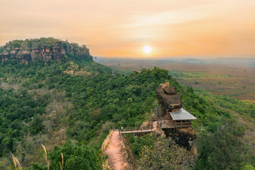 Obraz premium Unseen in thailand and amazing thailand,Phu tok mountain or Wat Jetiyakiree Viharn Temple with wooden trail round of the 7 floors mountain at Bueng Kan Province