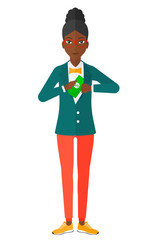 Woman putting money in pocket.