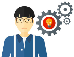 Man with bulb and gears.