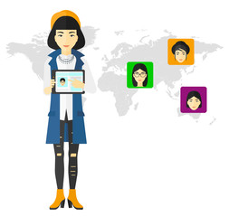 Woman holding tablet computer with social media source.