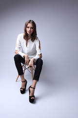 high fashion portrait of young elegant woman. Studio shot