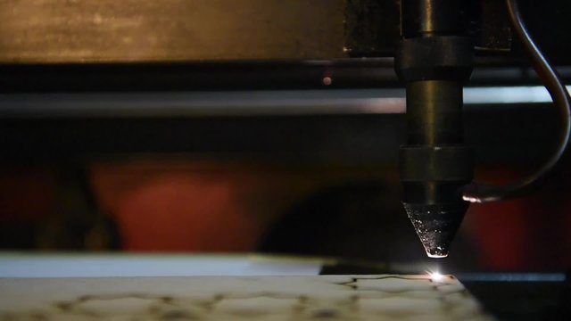 cnc laser  cutting of orient pattern decorative wood, modern industrial technology