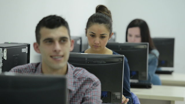 technology students group in computer lab classroom