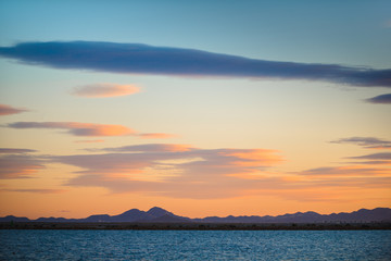 Amazing sky at sunset near the San Pedro del Pinatar. Region of Murcia. Spain