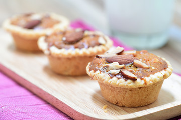 tart with almond nut on top