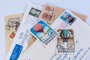 Collection of post stamps and old letters.