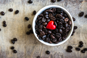 Coffee beans on rustic background