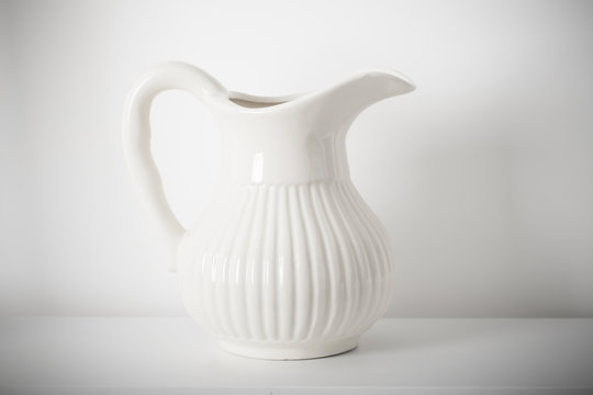 milk jug on white background