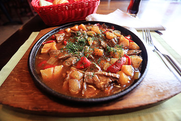 Served hot in a pan in a restaurant