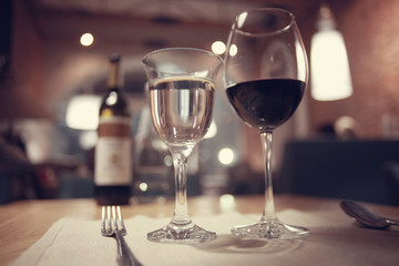 glass of wine, a restaurant serving a blurred background