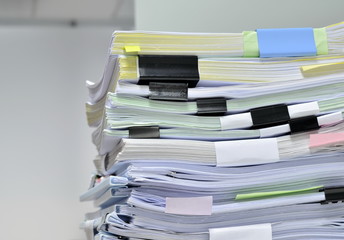 Pile of documents at workplace