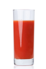 Glass full of fresh tomato juice isolated on white background