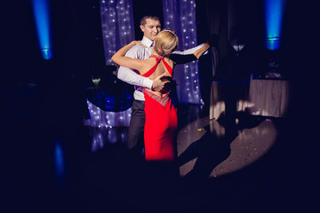 Obraz na płótnie Canvas A man and a woman dancing argentinian tango
