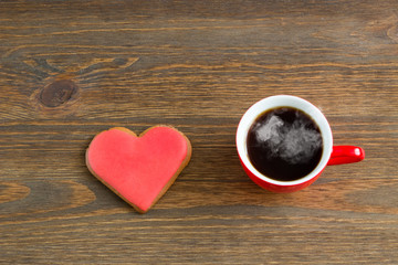 Heart cookies with cup of coffee