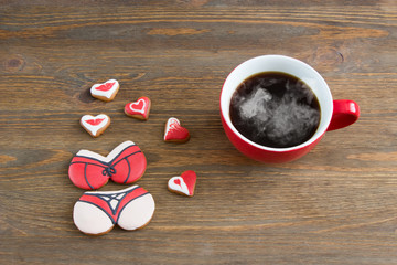 Heart cookies with cup of coffee