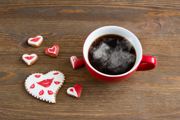 Heart cookies with cup of coffee