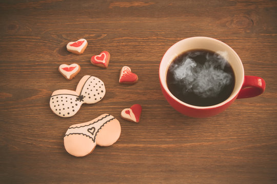 Heart cookies with cup of coffee, toned