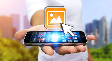 Young man using modern camera application