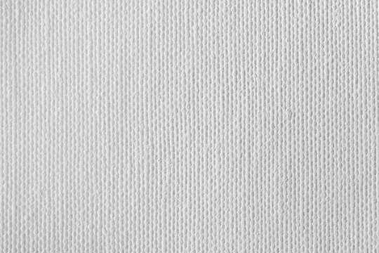 White canvas background or texture. Macro photo.