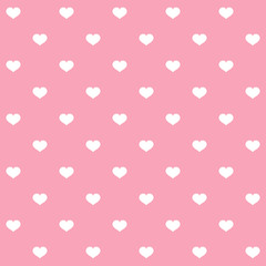 White polka dots hearts on pink background