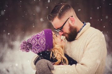 Happy couple in winter park