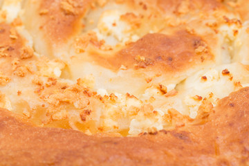 Closeup of puff cake with curd cheese.