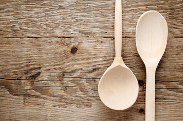 Two wooden spoons on table top view