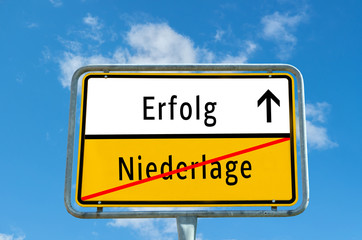 Ortstafel Erfolg/Niederlage