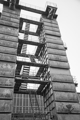 exterior steel staircase of one building in the factory
