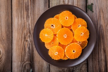 organic fresh juicy tangerine slices on a plate