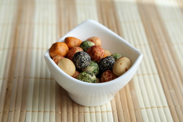 Mamegashi is a snack which peanuts entered in the inside. The traditional snack eaten as child's snack from the past in Japan.