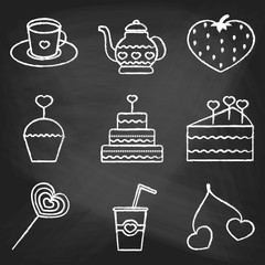 Set of love icons painted with white chalk on a blackboard. Decorative icons for Valentine's day. Hands-drawn style