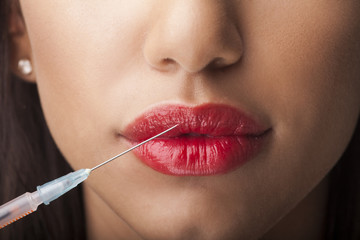 Woman with syringe