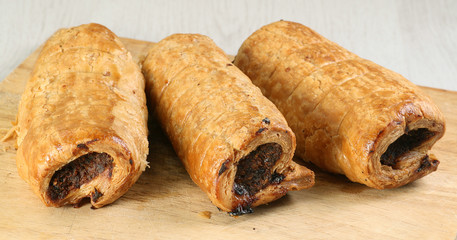 three sausage rolls