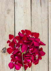 Rose Petals Border on a wooden table