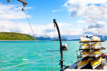 Fototapeta premium Kayaks stacked on a ship deck in Alaska. Location: Glacier Bay National Park