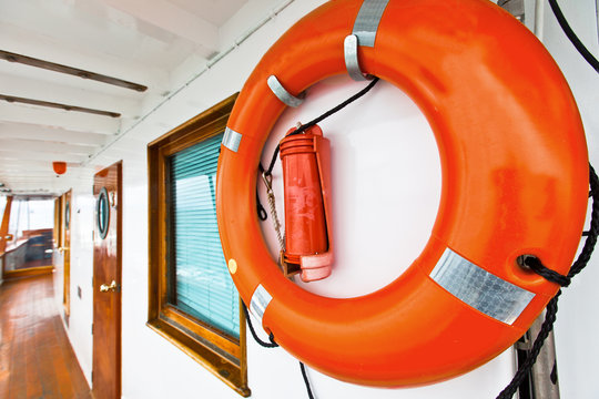 Life ring safety equipment on a small ship