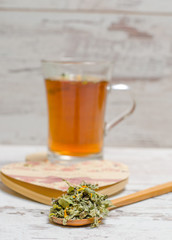 Cup of tea on wooden rustic background
