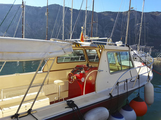 Deck of a yacht with the helm in the Boko-Kotor bay