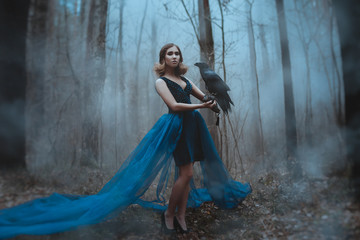 Fantasy woman with raven and huge book - obrazy, fototapety, plakaty