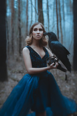 Fantasy woman with raven and huge book