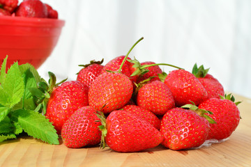 Fresh ripe strawberries on wooden table