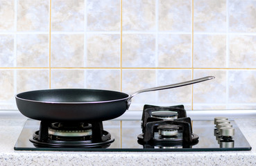 frying pan on the gas stove