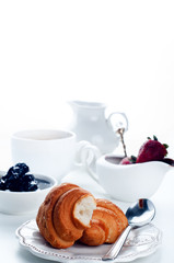 Breakfast with coffee and croissants