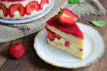 Strawberry cake; Fraisier cake on wooden background