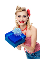 woman in pin-up style clothing with gift box, isolated