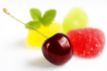 Multicolored marmalade on the white surface