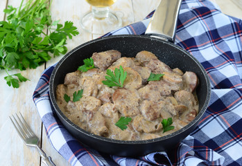 Chicken Liver in Creamy Sauce on Frying Pan